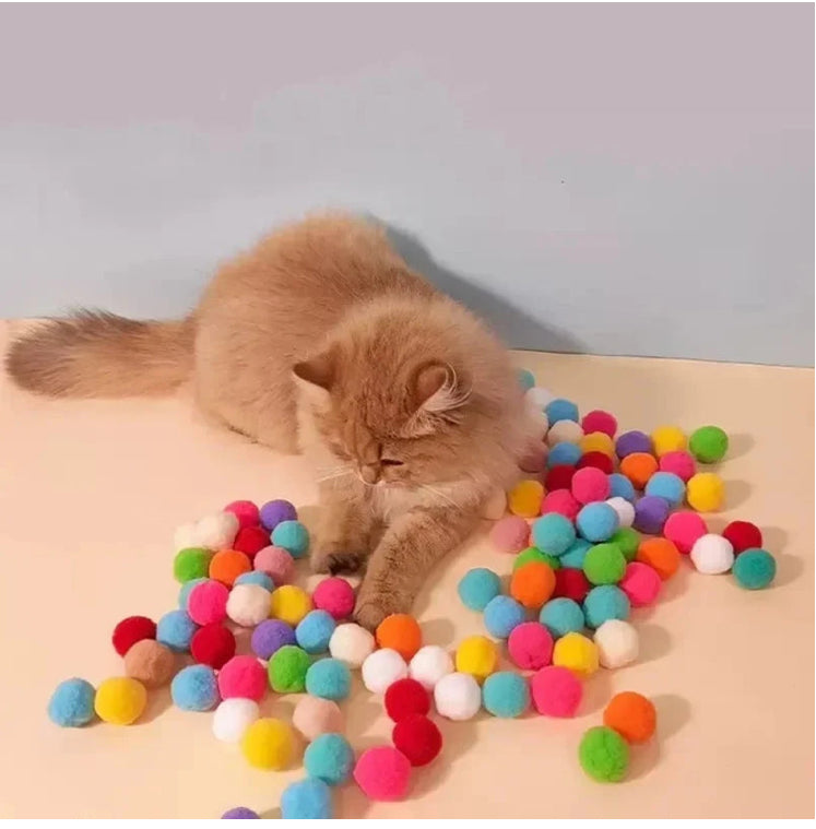 Brinquedo Pistola com Bolinhas de Pelúcia para Gatos